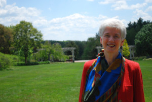 Suzanne Maas poses for a photo in the Lawn Garden.