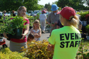 Staff helping out at the greenhouse.