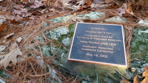Tower hill plaque engraved into a rock