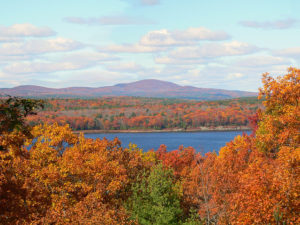 Wachusett Reservoir and Mountain surrounded by the fall foliage.