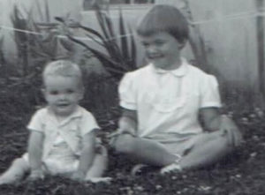 Share Your Love of Gardening Picture. Two children pose for a black and white photo.