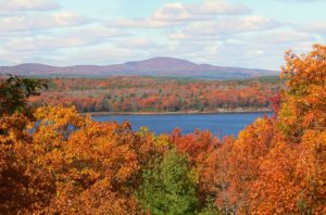 View of Wachusett Mountain and Reservoir with fall foliage.