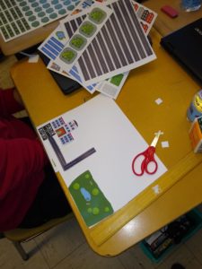 A desk filled with children activities