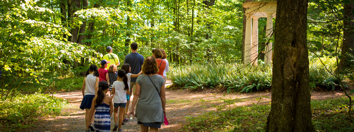 A group of visitors walks through the Inner Park.