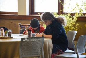 Visitors draw in Classroom A/B during April Vacation week.