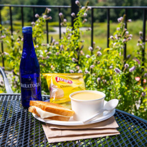 Grilled cheese and soup from the Farmer and the Fork cafe sits on one of our outdoor tables.