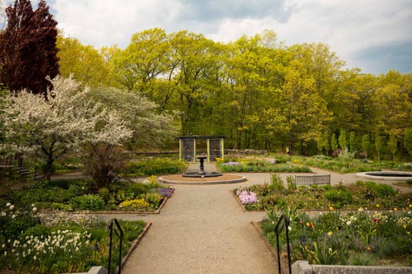 The Garden of Inspiration filled with plants blooming in late springtime.
