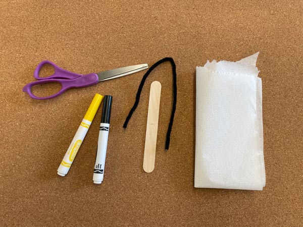 Materials needed for a children's activity laid out on the table.