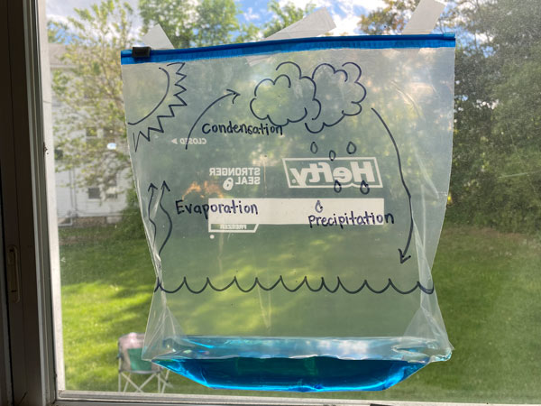 A ziploc bag taped to the window for a water activity