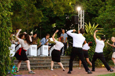 A group of visitors dancing during our special summer event, Swing Night