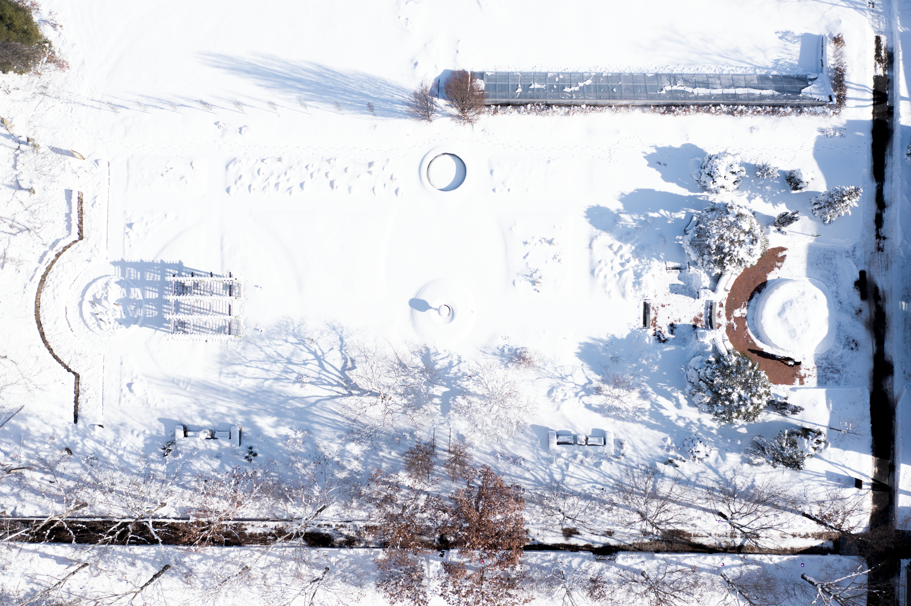 An aerial view of the Garden of Inspiration covered in snow