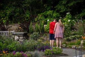 two members observing the garden