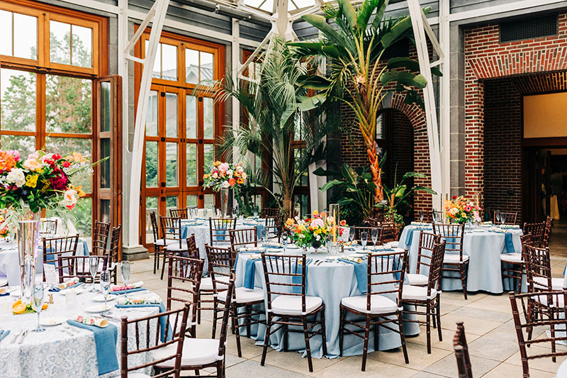 Wedding reception setup in the Orangerie conservatory