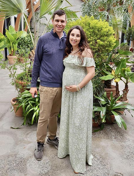 Couple posed for Baby Shower event at New England Botanic Garden