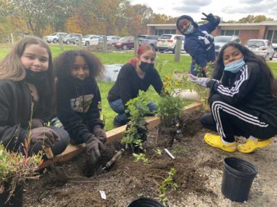 Clark-Street-Community-School Clark Street Community School gardening volunteers planting outdoors