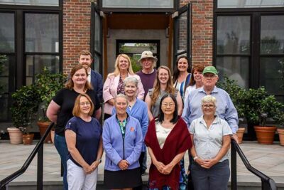 (From left to right) Community Greening Awardees from the Berlin Community Garden, Clark Street Community School Garden, Gardening the Community, Pine Hill Meadow Garden, and Town of Oxford were honored at the 184th Annual Meeting of the Worcester County Horticultural Society. Representatives of all but Gardening the Community (located in Springfield, MA) are seen photographed with New England Botanic Garden CEO, Grace Elton.