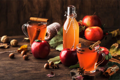Apples and cider on a table