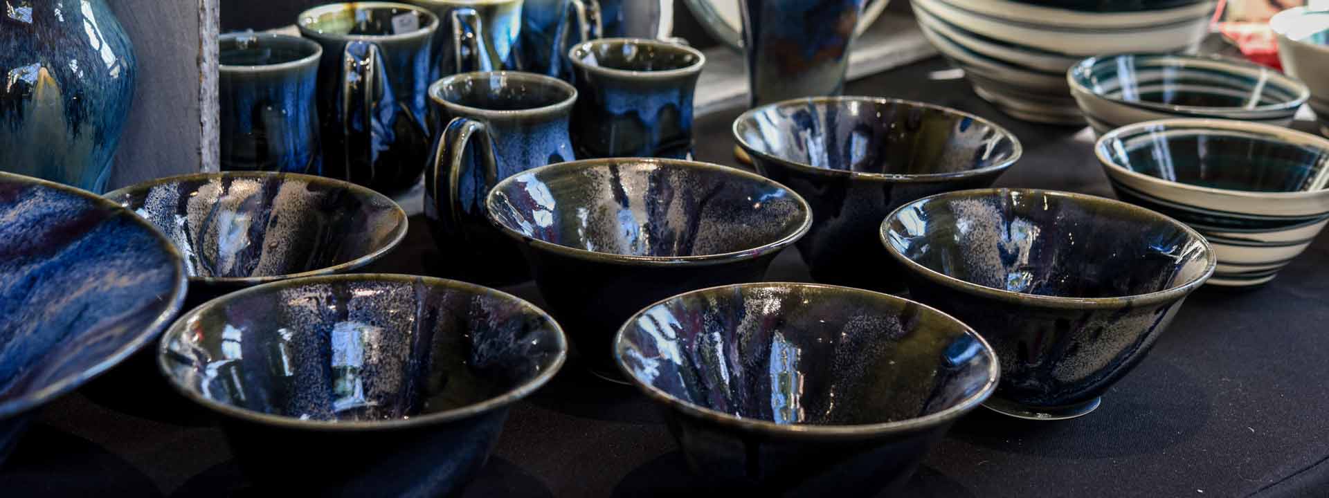 Blue ceramic bowls and mugs