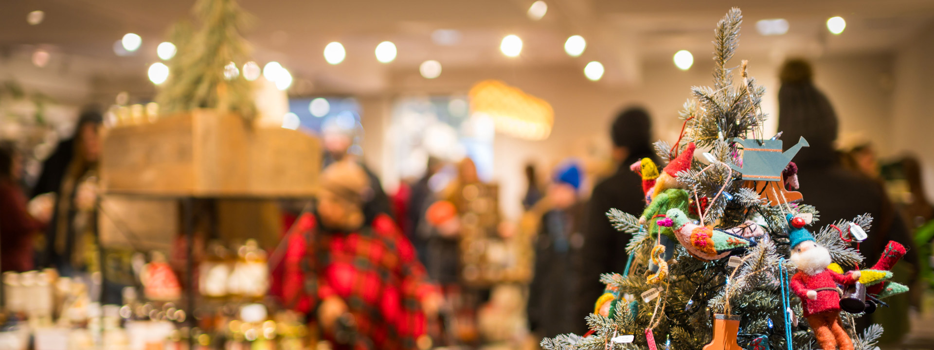 Holiday tree with gardening and bird ornaments at the Garden shop