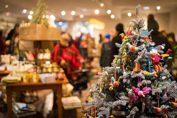 Holiday tree with garden and bird ornaments at the Garden shop