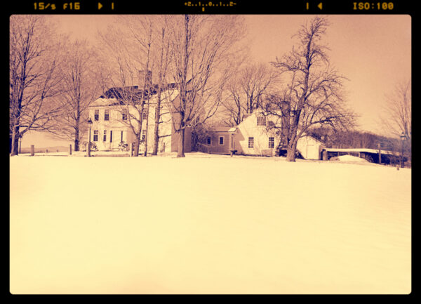 Historical image of the farm house at New England Botanic Garden