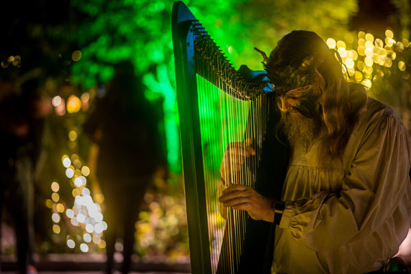 A character playing a harp