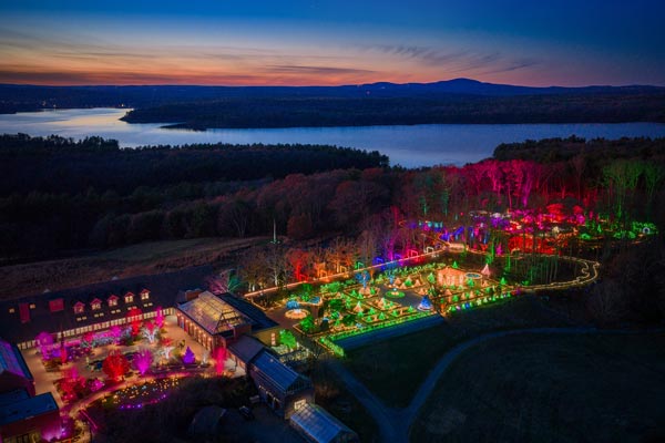 Drone image of the Garden during Night Lights, overlooking the Wachusett Reservoir