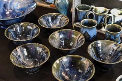 Blue ceramic bowls and mugs