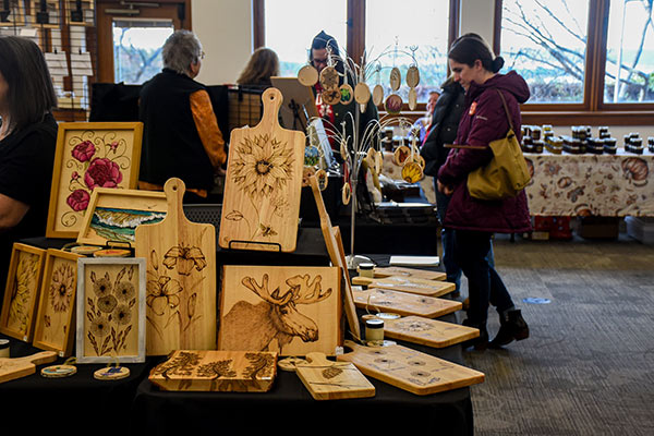 Custom wood home trinkets sold at the Holiday Marketplace